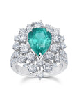 Breathtaking double-halo Paraiba tourmaline ring with dazzling diamond detail surrounding the stone